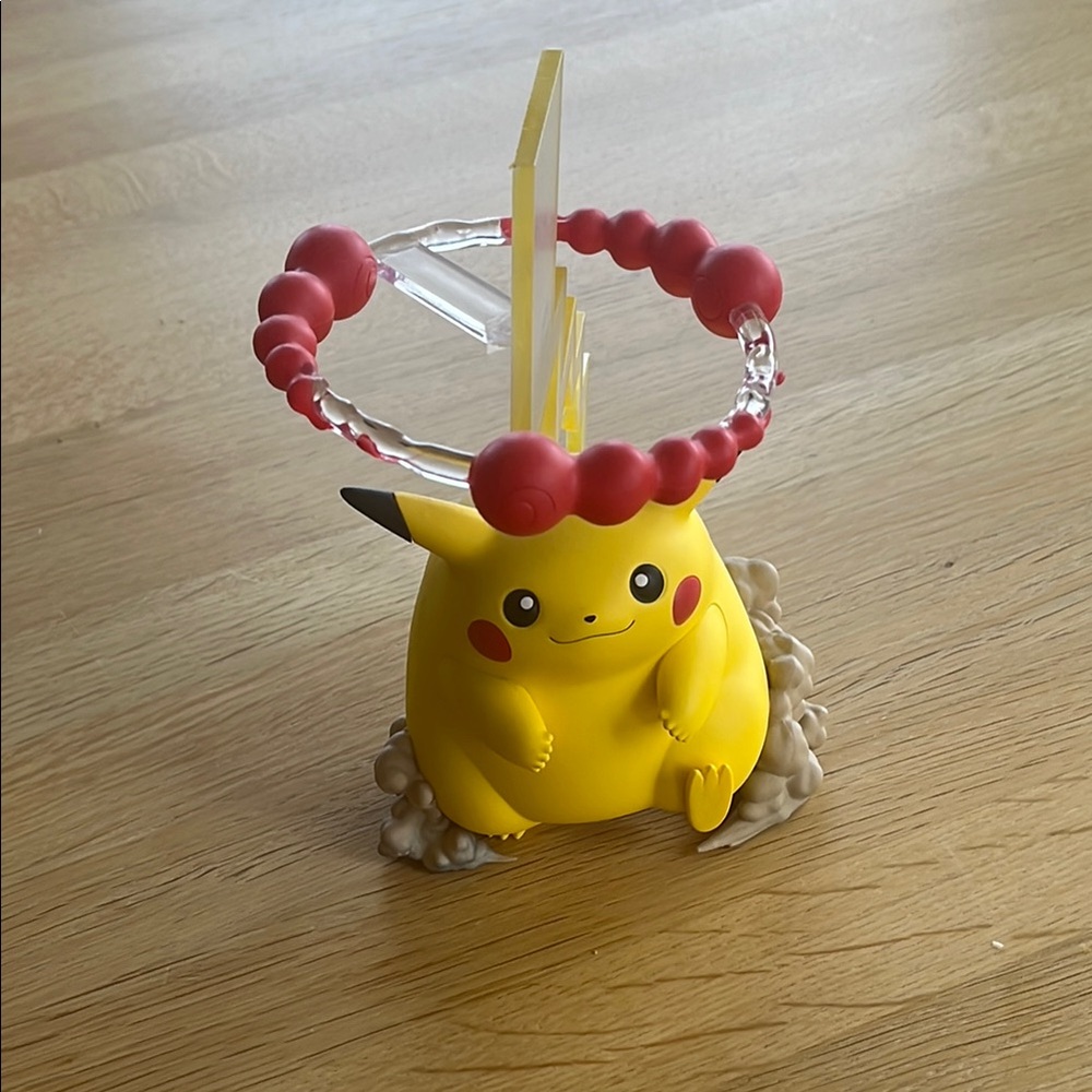 Yellow Pikachu Figurine with Red Accents
